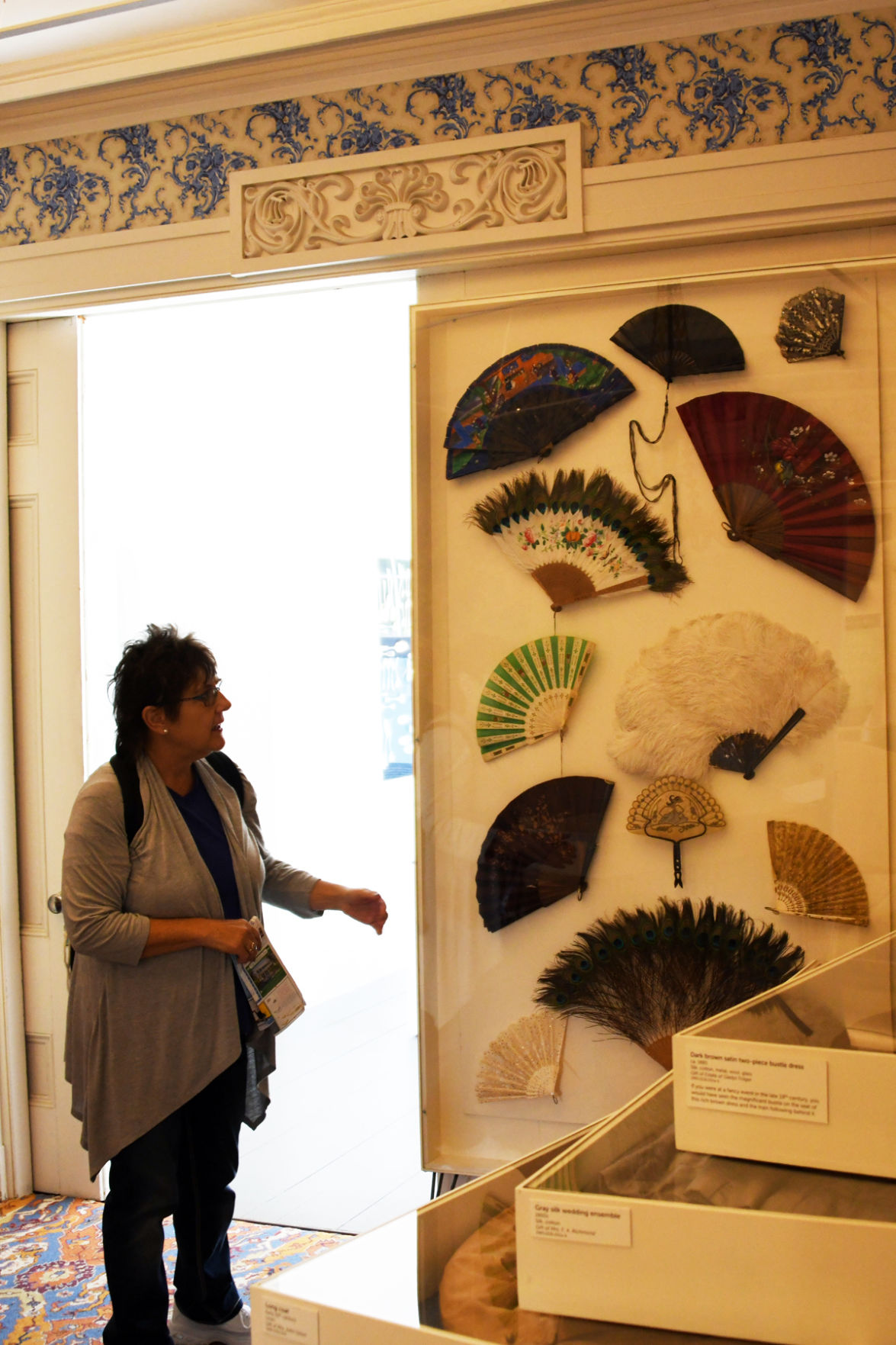 115 Pat Carpenter admired the decorative fans on display at the Hadwen House.jpg